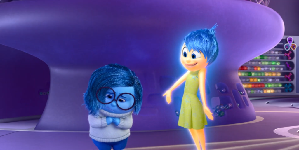 As personagens Alegria e Tristeza na animação Divertida Mente, um ótimo filme sobre inteligência emocional, psicologia e regulação de sentimentos.